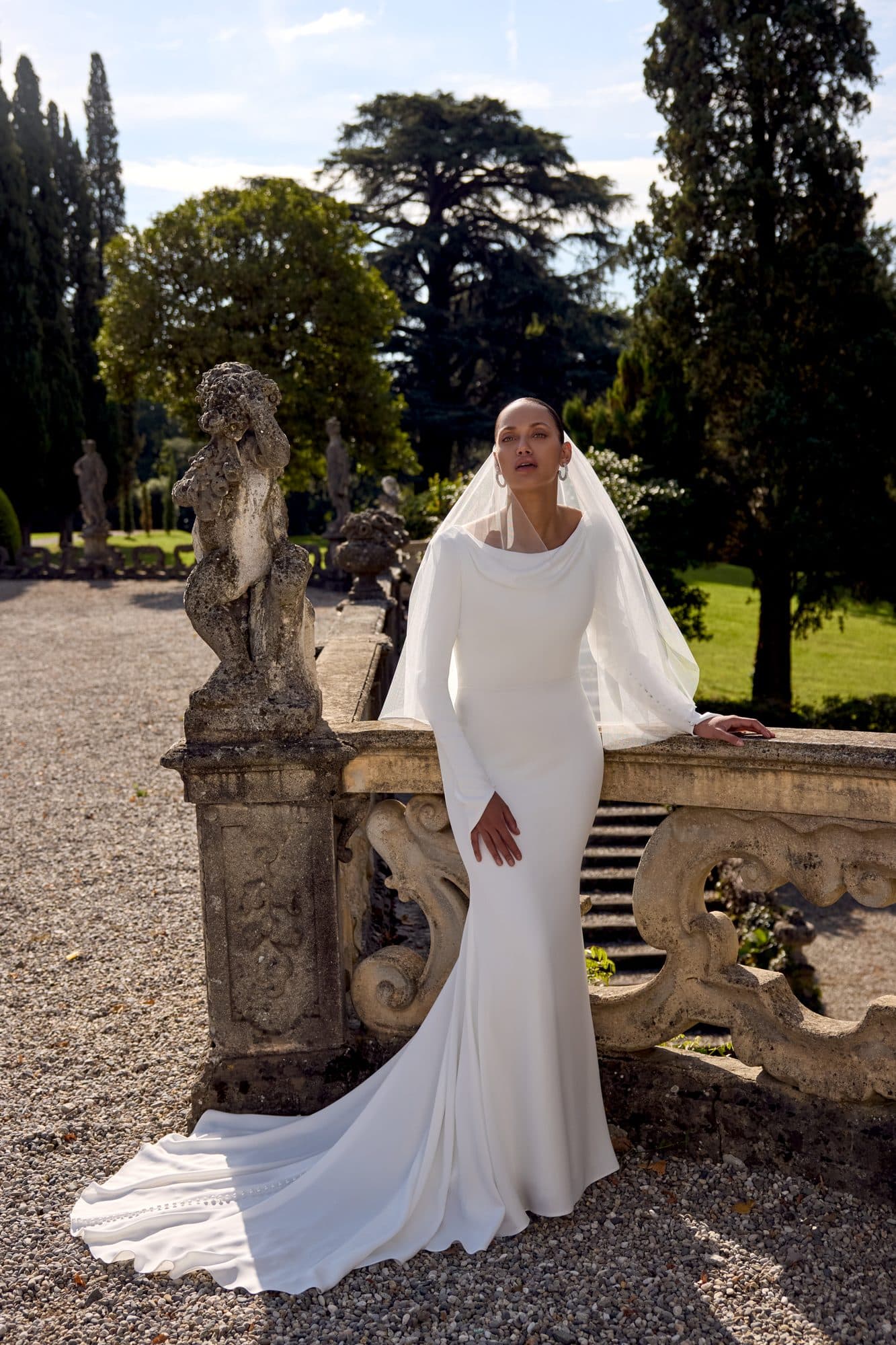 Front of the Justin Alexander Kathleen gown, a long-sleeved cowl-neck crepe fit-and-flare.