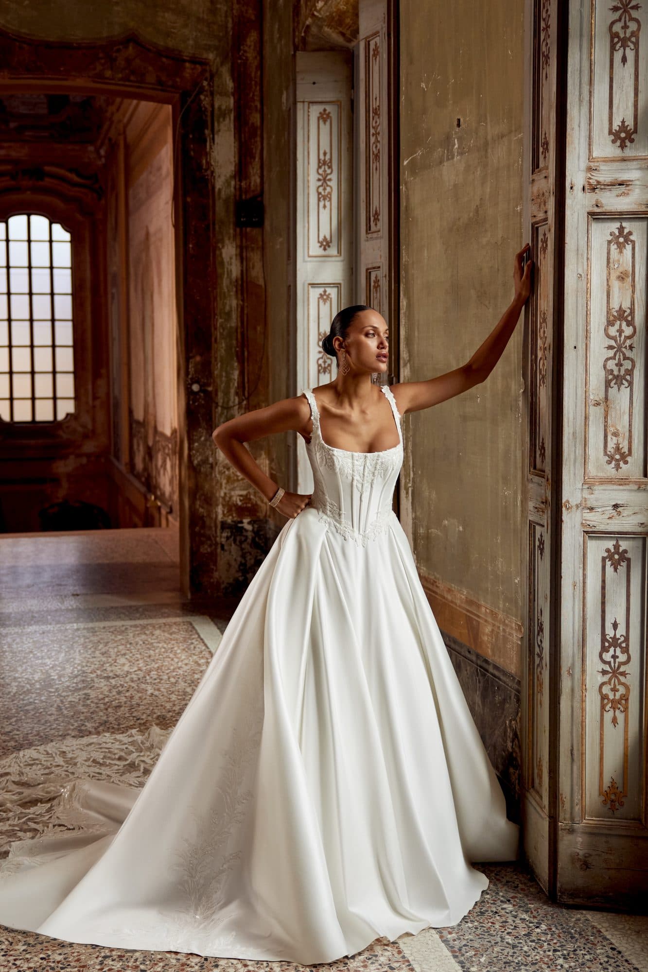 Front of the Justin Alexander Keegan gown, a structured square-neck ballgown in mikado.