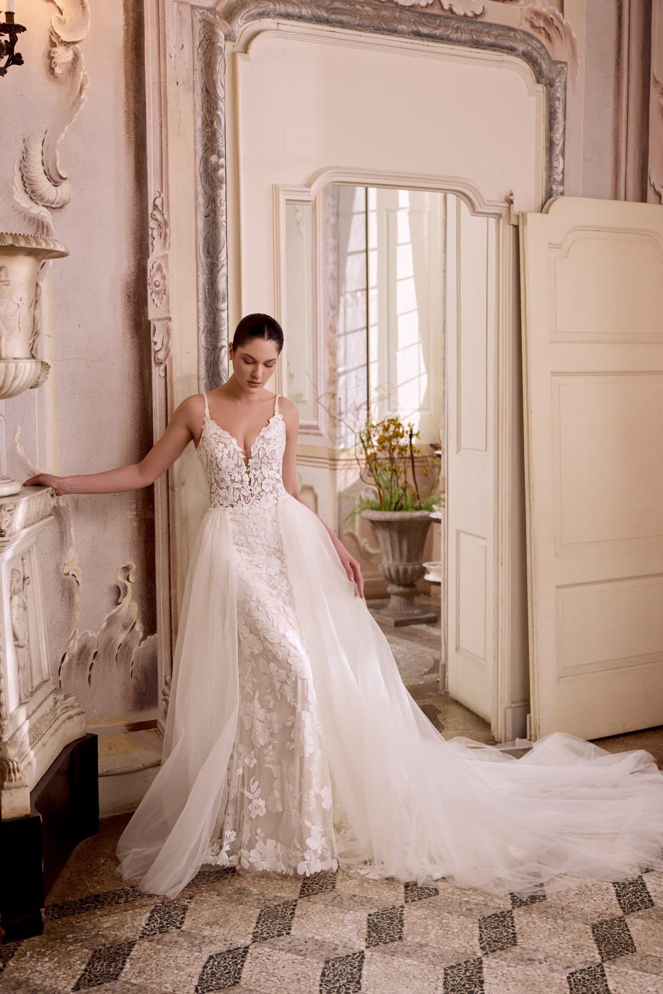 Front of the Justin Alexander Liza gown, a plunging lace bodice with fine straps and a soft tulle skirt.