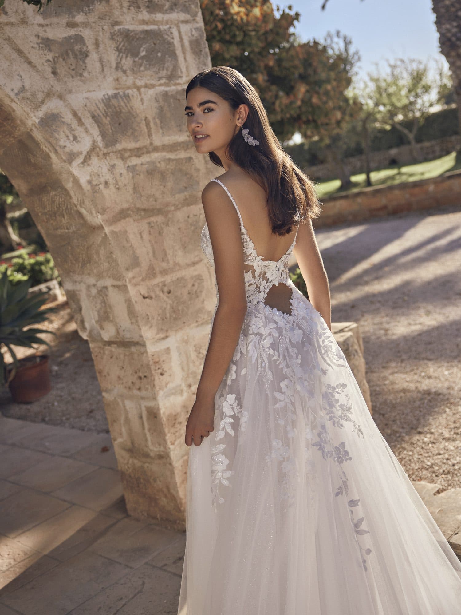 Back of the Modeca Mivonne gown showing its low lace back.